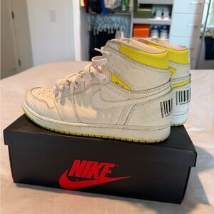 Nike Air Jordan High-Tops with Yellow Highlights